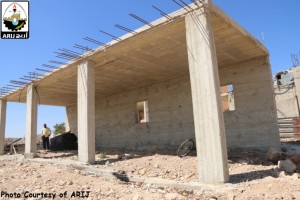 House in construction by local residents in Kisan Village, southeast Bethlehem